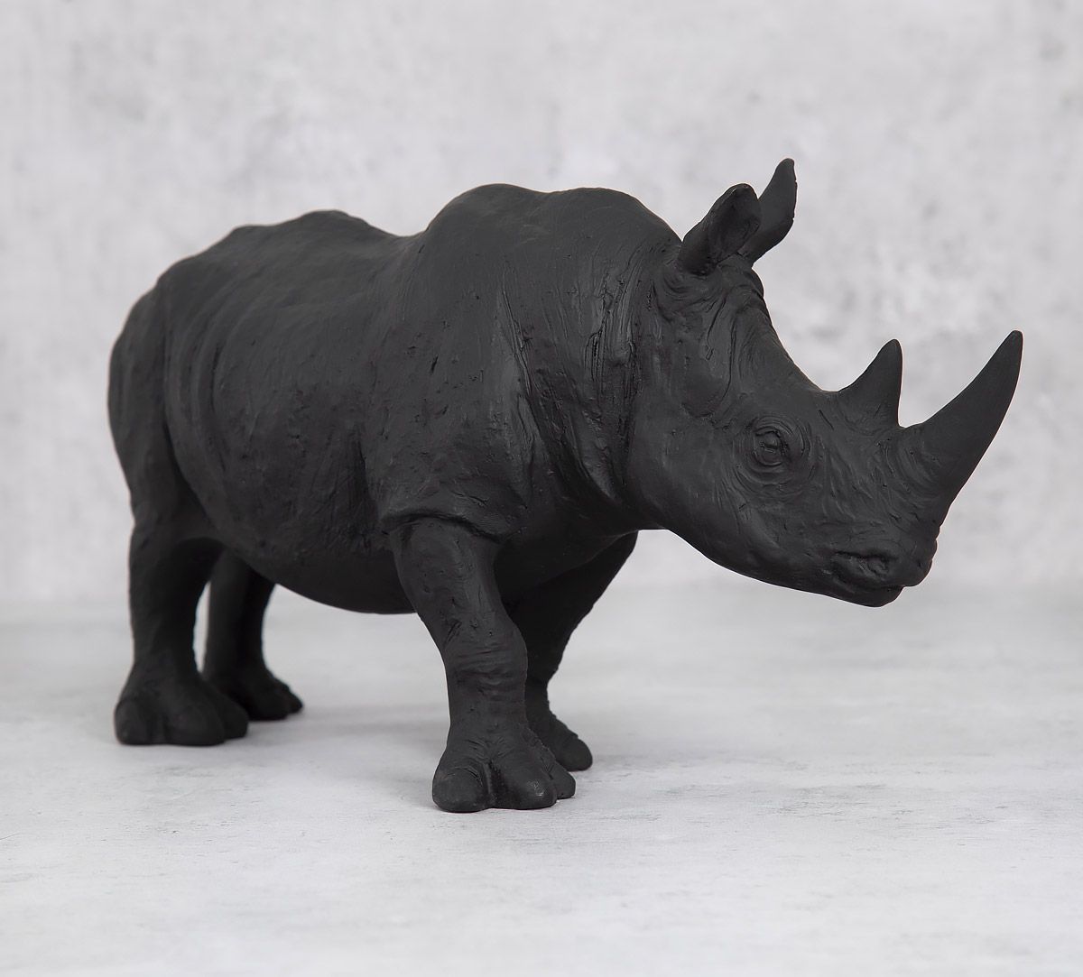 India Circus Black Rhino Calf Figurine